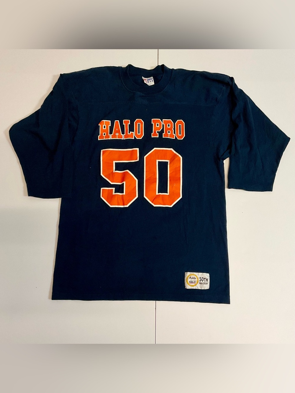Vintage Halo Navy 3/4 Sleeve Tee with Orange '50' Graphic